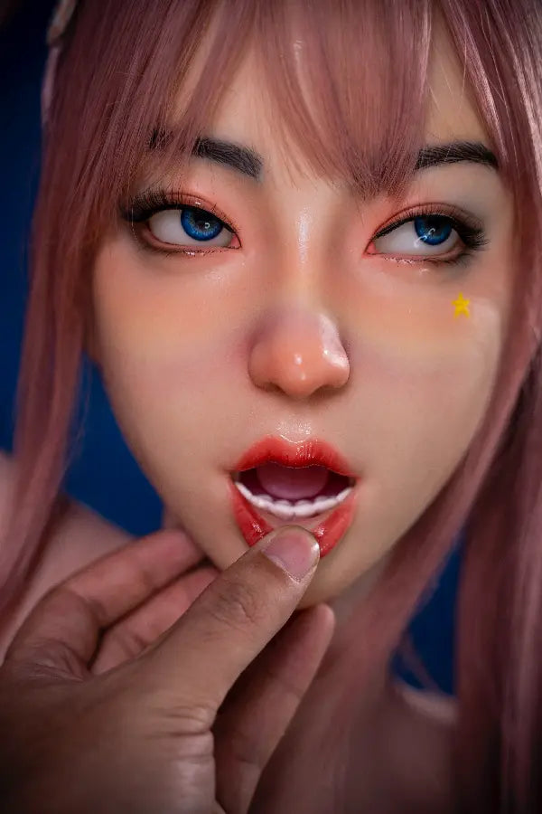Close-up of movable jaw and permanent makeup on a silicone doll