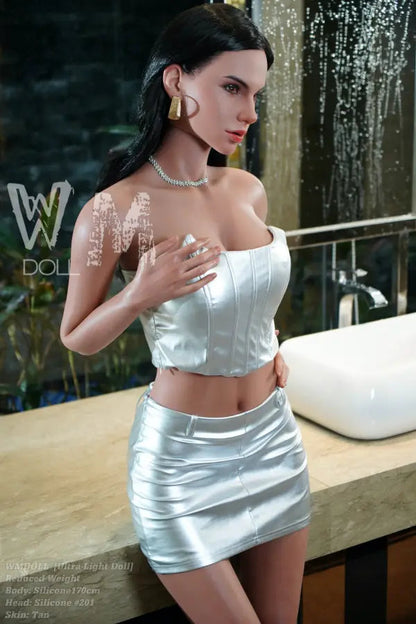 Lateral angle of Blair demonstrating her solid freestanding structural balance and premium tan complexion.