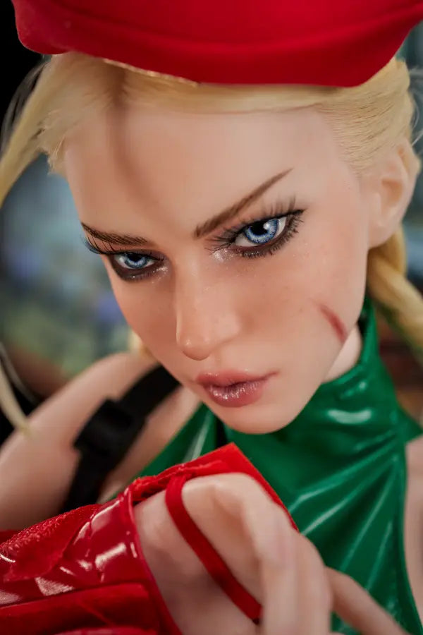 Detail shot of Ka’s realistic implanted hairline and blonde braids.