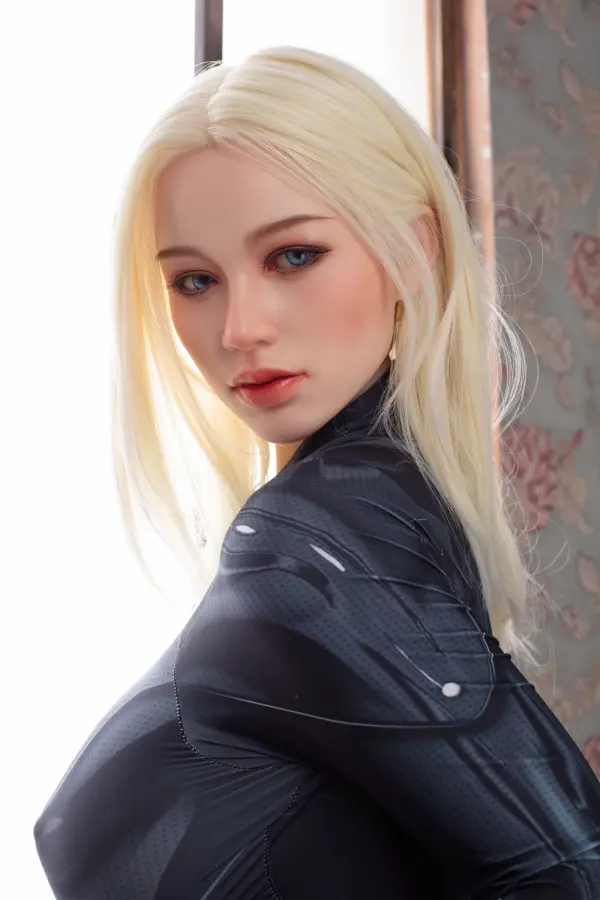 Nova – 162cm (5'3") J-Cup Bust TPE Sex Doll - US Stock 7 Front view of Nova, a 162cm TPE sex doll in a tight black bodysuit, showing long blonde hair and J-cup bust.